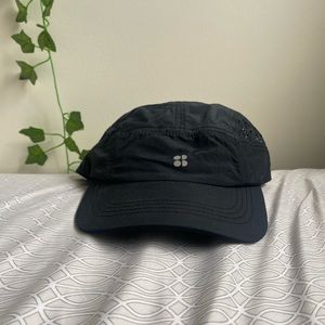 Brand new never worn Sweaty Betty Swiftie Run Cap. Tags included.